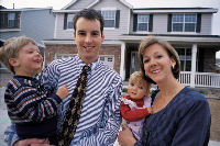 Happy family moving into new home